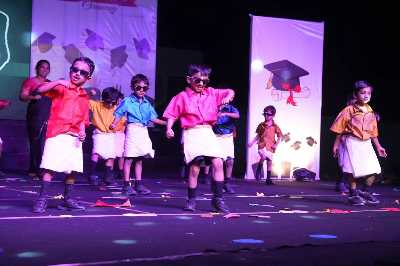 Children performing music on stage